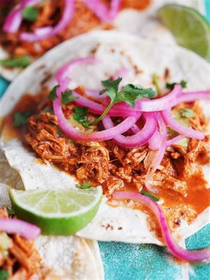  コチニタピビルの香ばしい風味とジューシーな食感を味わってみませんか！ メキシコ・グアダラハラ発、豚肉をじっくり煮込んだ伝統料理の奥深さを探る